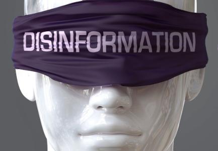 Disinformation can blind our views and limit perspective - pictured as word Disinformation on eyes to symbolize that Disinformation can distort perception of the world, 3d illustration